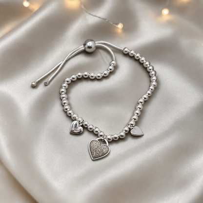 Nova memorial bracelet - three hearts beaded draw string bracelet, in natural ash, handcrafted in Lancashire UK - by Keepsake Memorial Jewellery