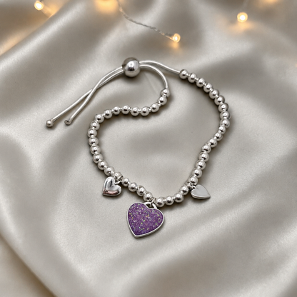 Nova memorial bracelet - three hearts beaded draw string bracelet, in rose pink, handcrafted in Lancashire UK - by Keepsake Memorial Jewellery