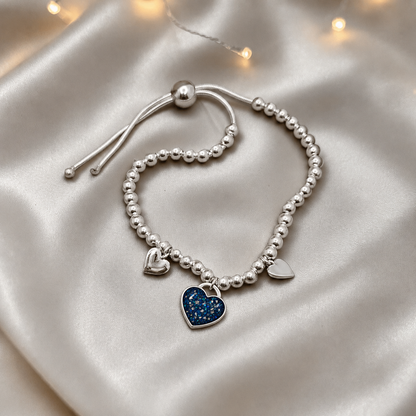 Nova memorial bracelet - three hearts beaded draw string bracelet, in sapphire glow, handcrafted in Lancashire UK - by Keepsake Memorial Jewellery