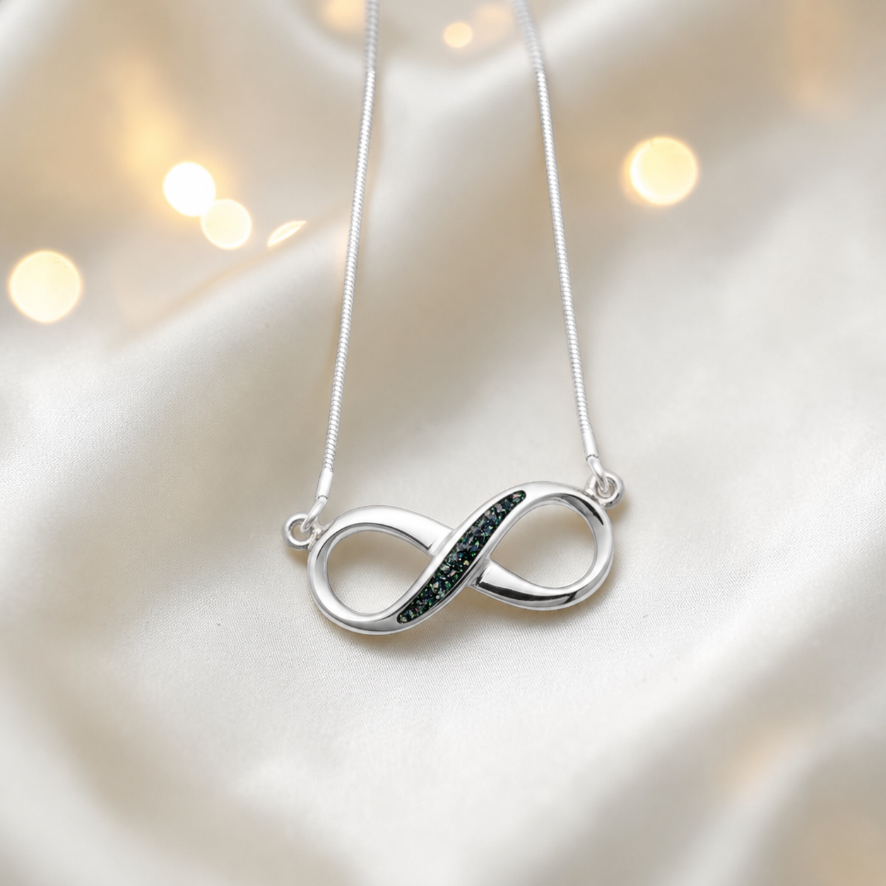 Nunki infinity memorial pendant in black flame, handcrafted in Lancashire UK - by Keepsake Memorial Jewellery