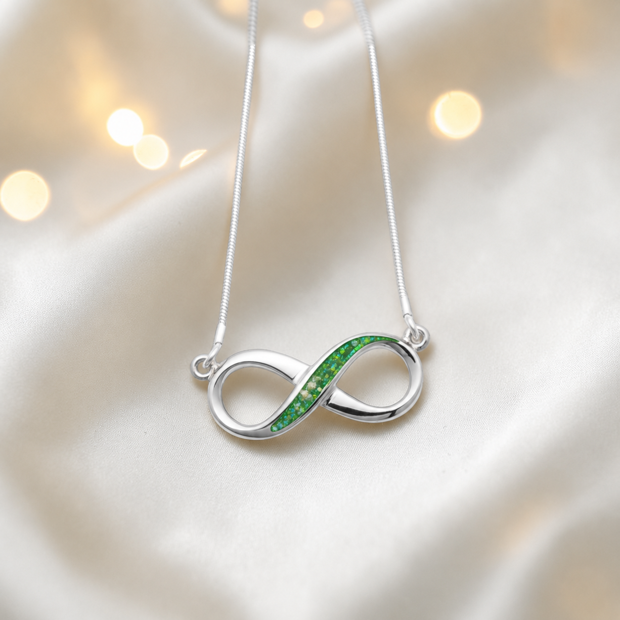 Nunki infinity memorial pendant in fruit green, handcrafted in Lancashire UK - by Keepsake Memorial Jewellery