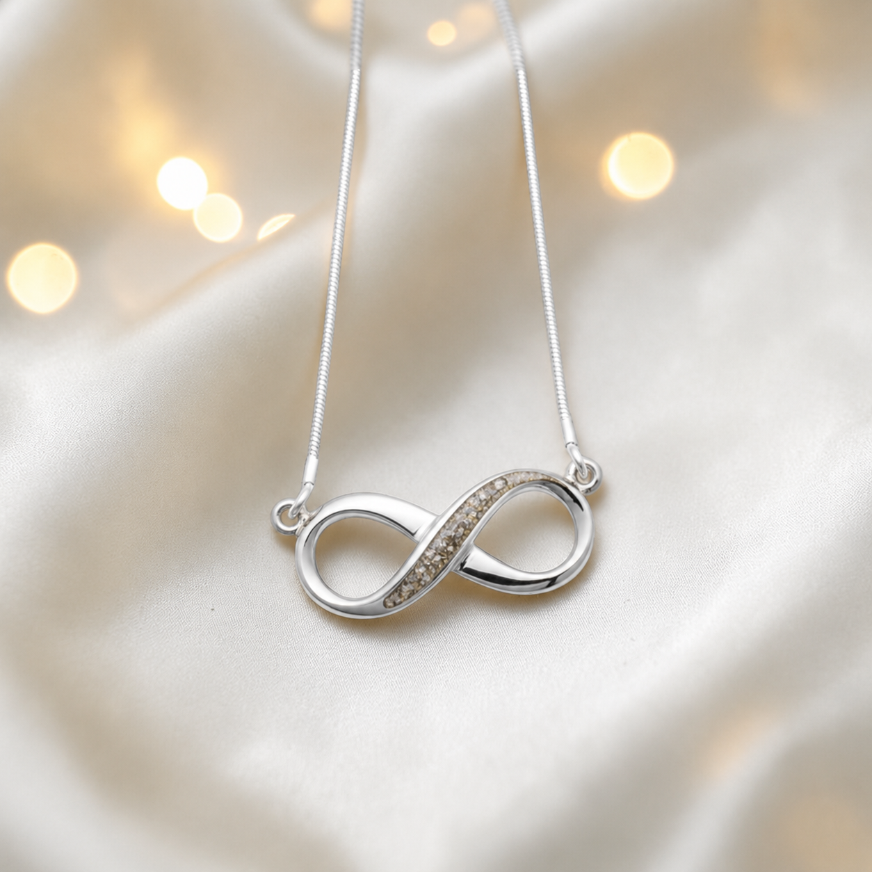 Nunki infinity memorial pendant in  natural ash, handcrafted in Lancashire UK - by Keepsake Memorial Jewellery