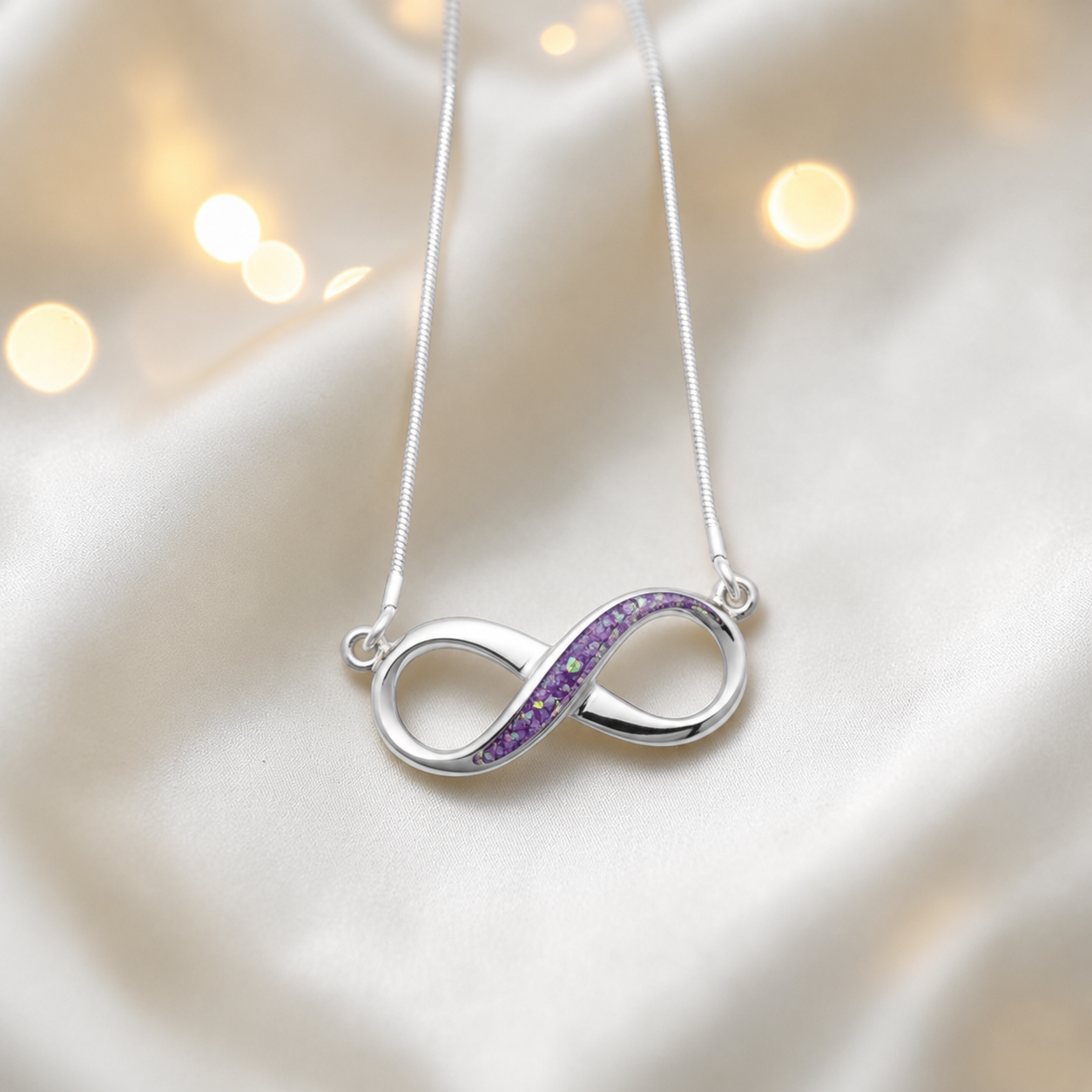 Nunki infinity memorial pendant in rose pink, handcrafted in Lancashire UK - by Keepsake Memorial Jewellery