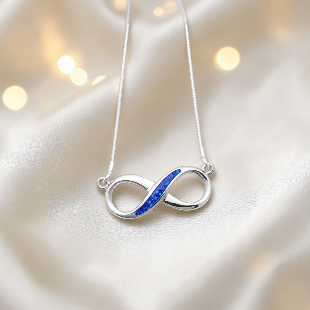 Nunki infinity memorial pendant in royal blue, handcrafted in Lancashire UK - by Keepsake Memorial Jewellery