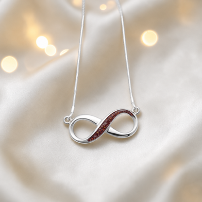 Nunki infinity memorial pendant in ruby red, handcrafted in Lancashire UK - by Keepsake Memorial Jewellery