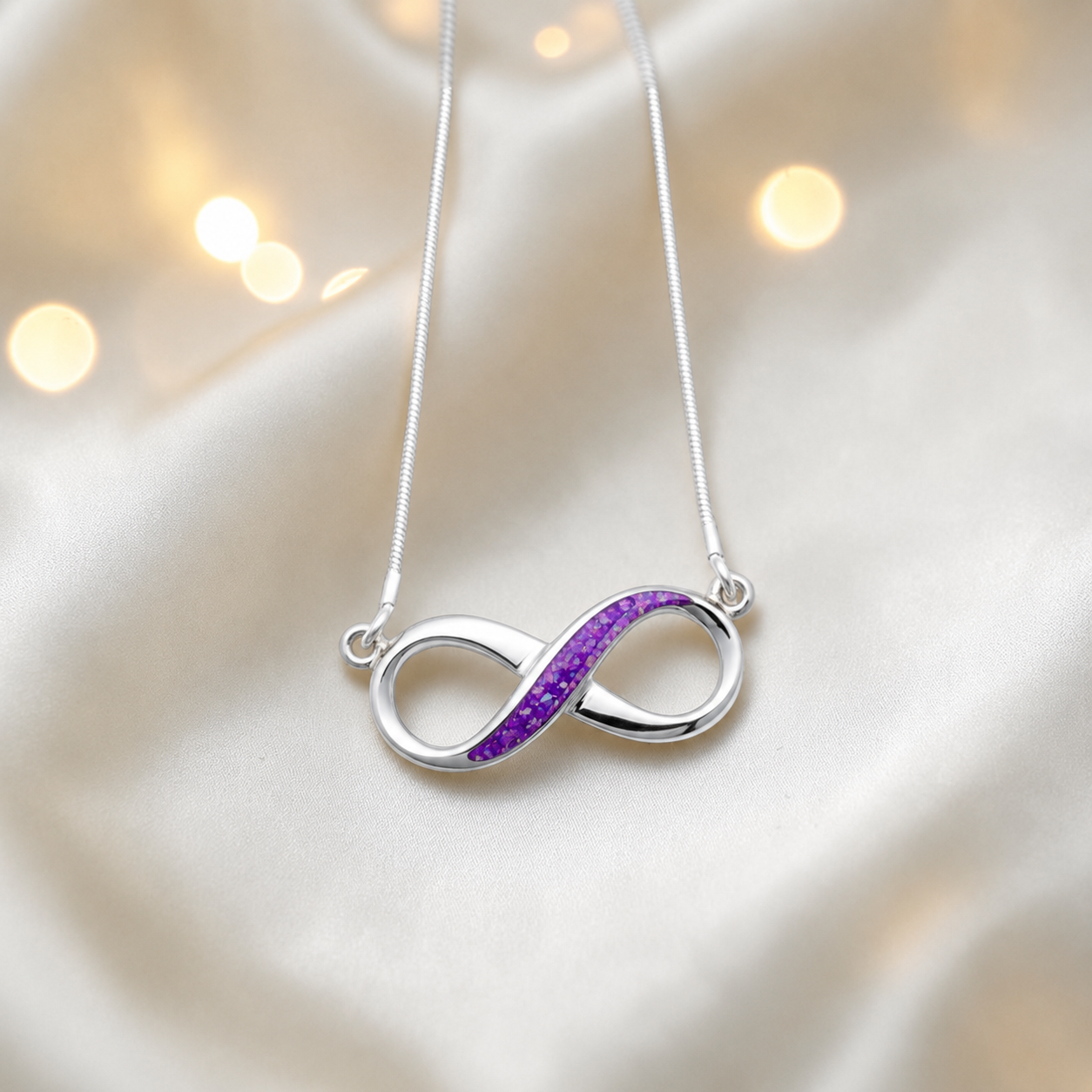 Nunki infinity memorial pendant in sleepy lavender, handcrafted in Lancashire UK - by Keepsake Memorial Jewellery