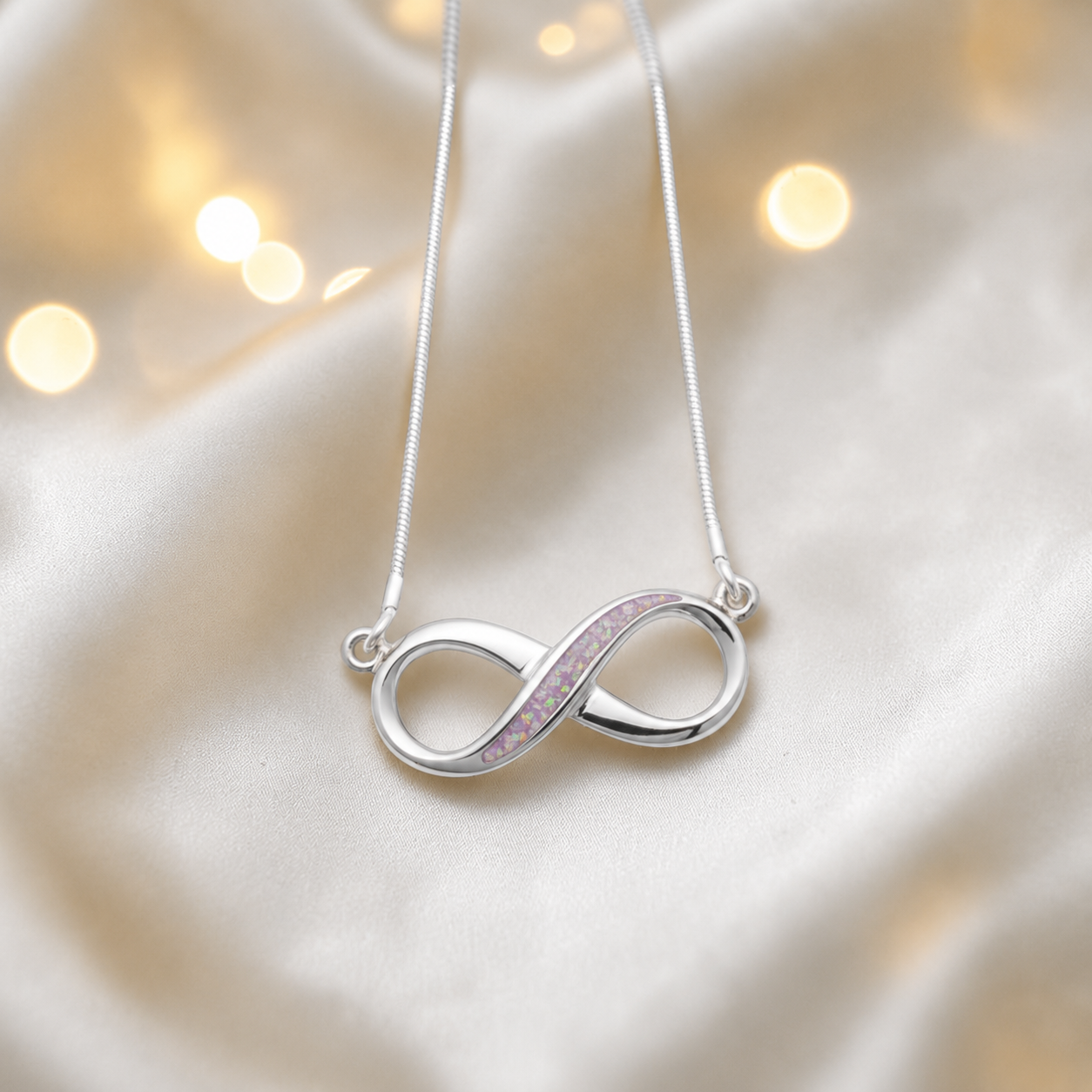 Nunki infinity memorial pendant in unicorn purple, handcrafted in Lancashire UK - by Keepsake Memorial Jewellery