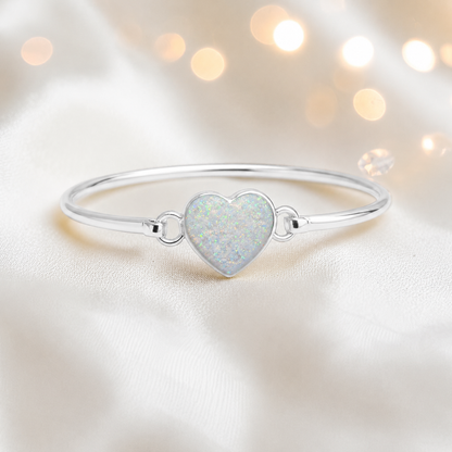 Nyx Bangle — silver heart shaped ashes memorial bangle in white snow, handcrafted in Lancashire, UK - by Keepsake Memorial Jewellery