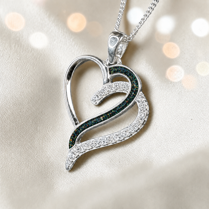 Olive Heart shaped memorial ashes pendant with CZ stones and black flame. handcrafted in Lancashire, UK.