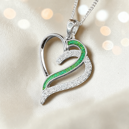 Olive Heart shaped memorial ashes pendant with CZ stones and fruit green resin. handcrafted in Lancashire, UK.