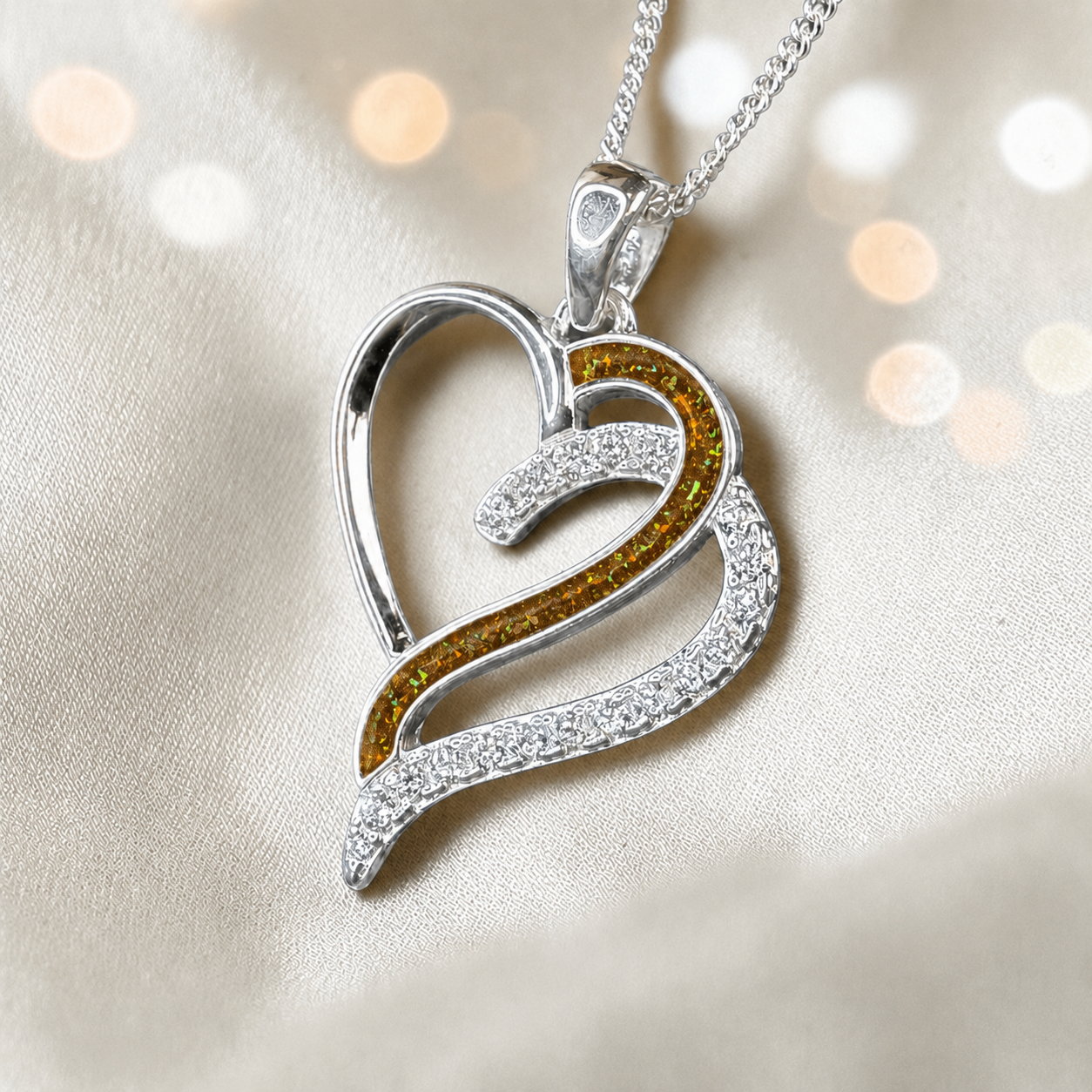 Olive Heart shaped memorial ashes pendant with CZ stones and gold olive. handcrafted in Lancashire, UK.
