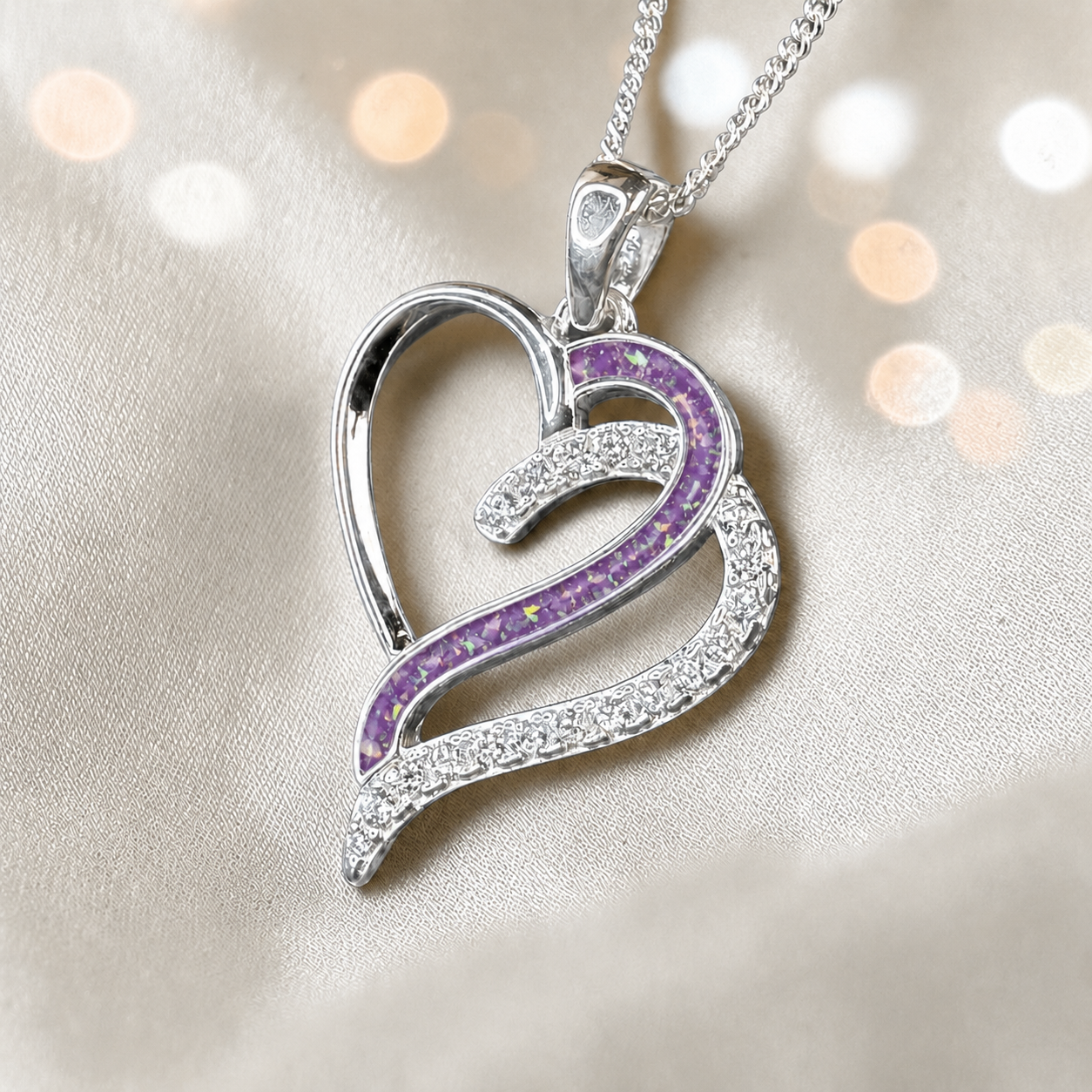 Olive Heart shaped memorial ashes pendant with CZ stones and rose pink resin. handcrafted in Lancashire, UK.