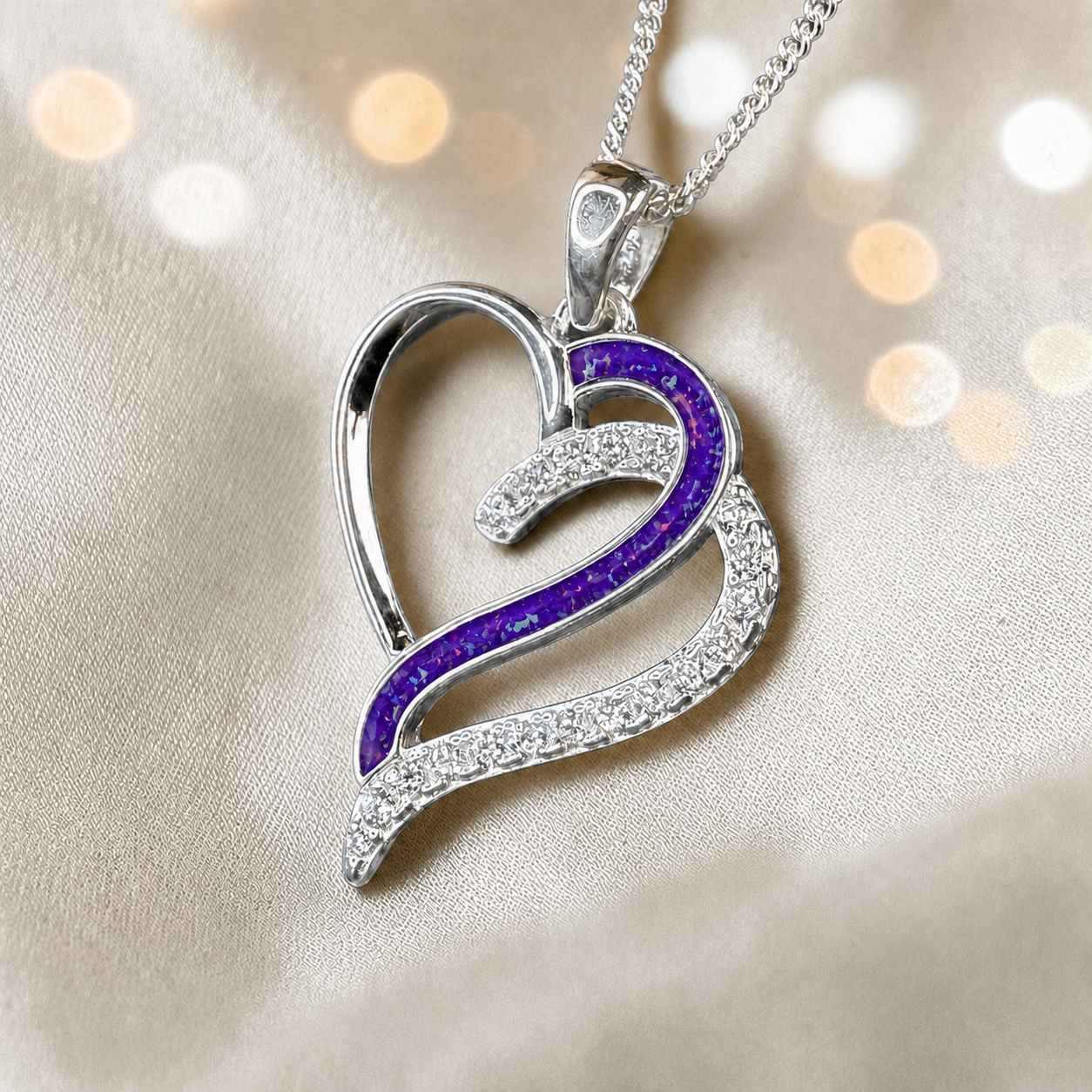 Olive Heart shaped memorial ashes pendant with CZ stones and sleepy lavender resin. handcrafted in Lancashire, UK.