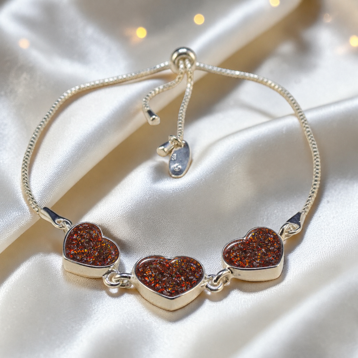 Orion Bracelet — silver three heart ashes memorial bracelet, in copper mocha, handcrafted in Lancashire, UK - by Keepsake Memorial Jewellery