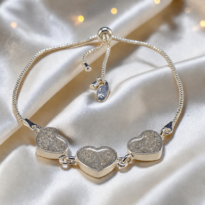 Orion Bracelet — silver three heart ashes memorial bracelet, in natural ash, handcrafted in Lancashire, UK - by Keepsake Memorial Jewellery