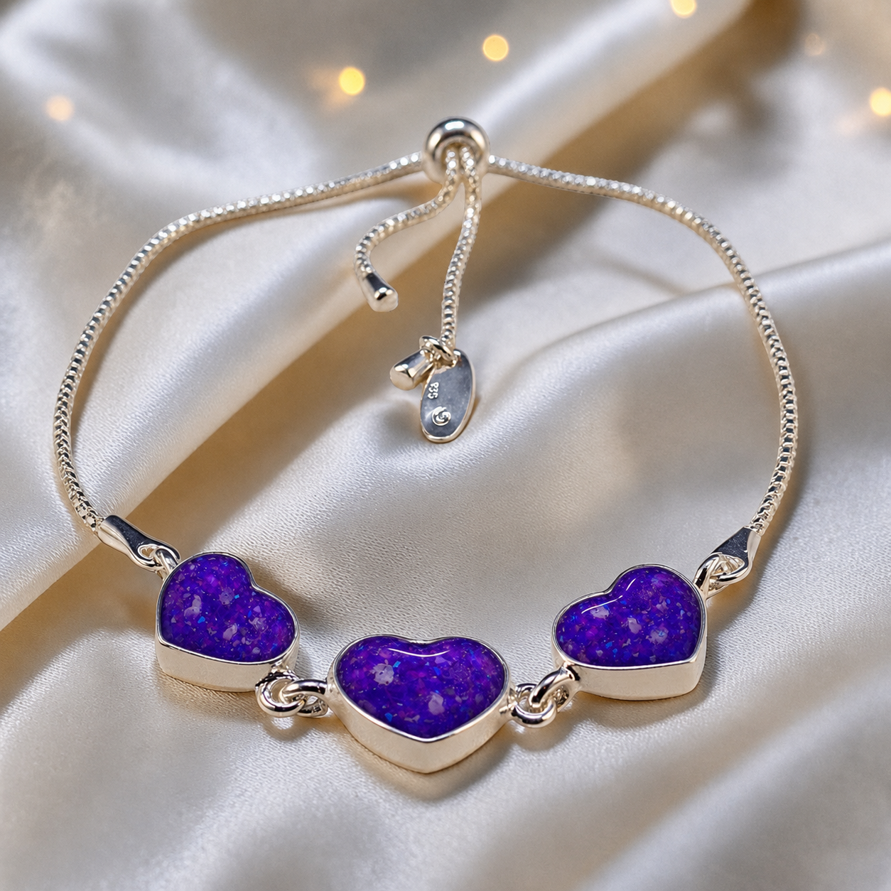 Orion Bracelet — silver three heart ashes memorial bracelet, in sleepy lavender, handcrafted in Lancashire, UK - by Keepsake Memorial Jewellery
