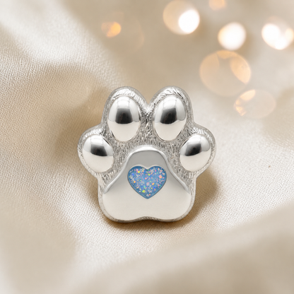Paw print of love, Stainless steel paw print ashes ornament in baby blue, handcrafted in Lancashire, UK - by Keepsake Memorial Jewellery