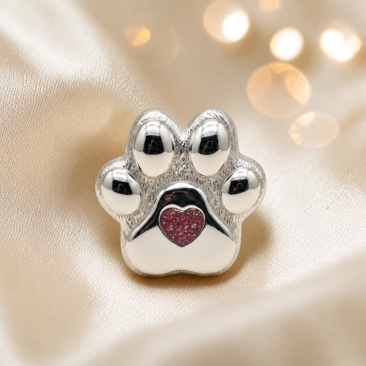Pawprint of love, Stainless steel paw print ashes ornament in ruby red, handcrafted in Lancashire, UK - by Keepsake Memorial Jewellery