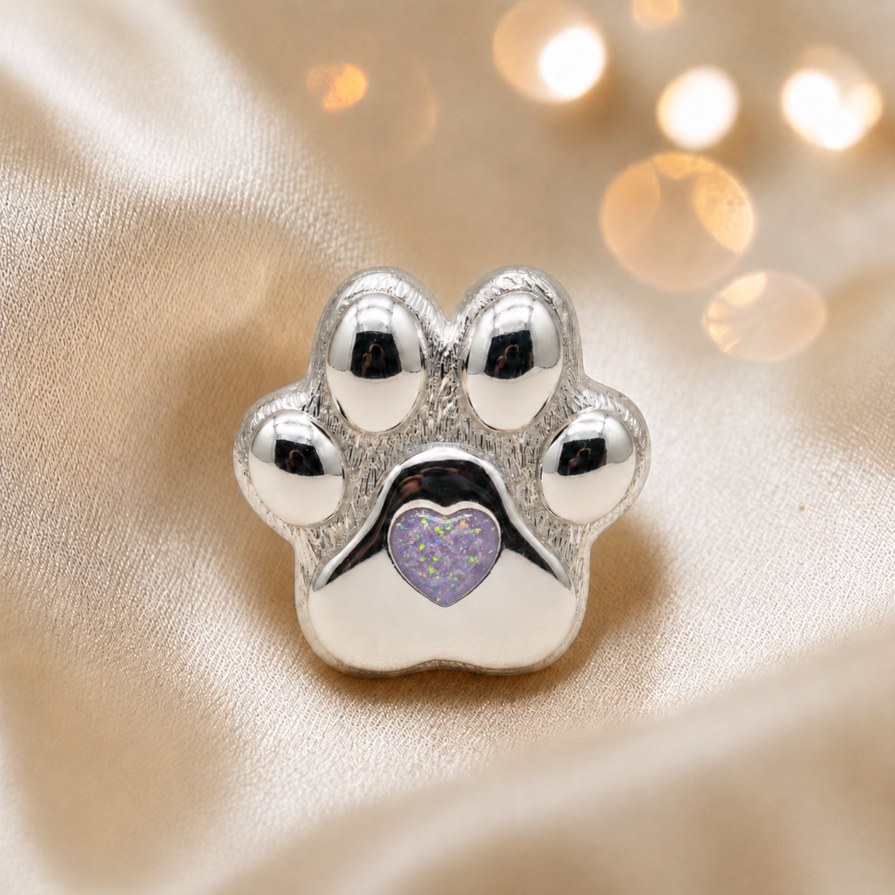 Pawprint of love, Stainless steel paw print ashes ornament in unicorn purple, handcrafted in Lancashire, UK - by Keepsake Memorial Jewellery