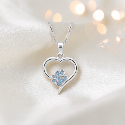 Penny Paw Pendant - heart shaped ashes memorial pendant with paw detail in baby blue, handcrafted in Lancashire UK - by Keepsake Memorial Jewellery