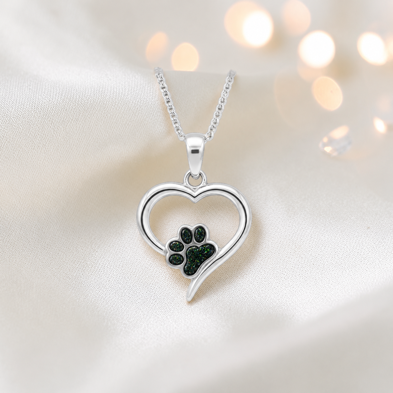 Penny Paw Pendant - heart shaped ashes memorial pendant with paw detail in black flame, handcrafted in Lancashire UK - by Keepsake Memorial Jewellery