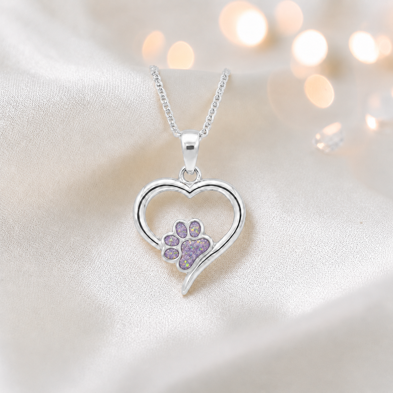 Penny Paw Pendant - heart shaped ashes memorial pendant with paw detail in unicorn purple, handcrafted in Lancashire UK - by Keepsake Memorial Jewellery