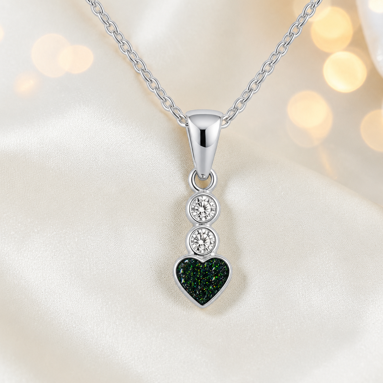 Pleione dainty heart ashes pendant in black flame, handcrafted in Lancashire UK - by Keepsake Memorial Jewellery