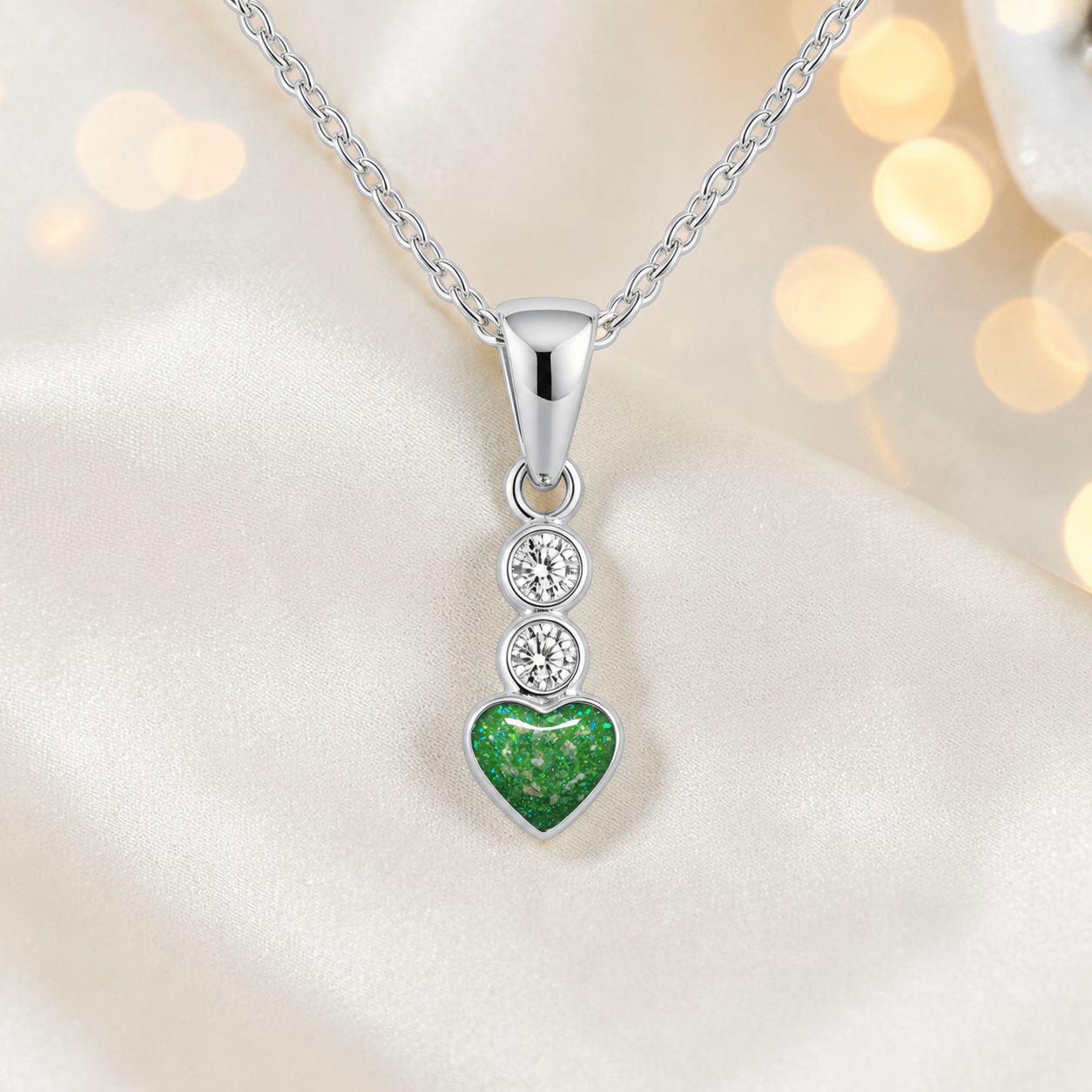 Pleione dainty heart ashes pendant in fruit green, handcrafted in Lancashire UK - by Keepsake Memorial Jewellery
