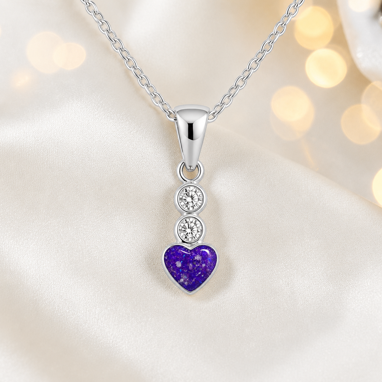 Pleione dainty heart ashes pendant in sleepy lavender, handcrafted in Lancashire UK - by Keepsake Memorial Jewellery