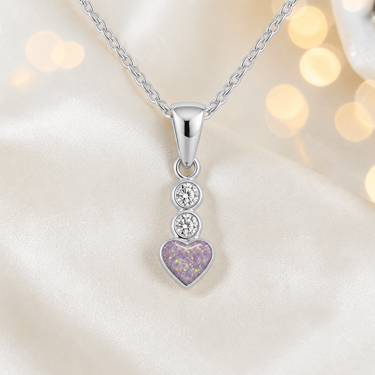 Pleione dainty heart ashes pendant in unicorn purple, handcrafted in Lancashire UK - by Keepsake Memorial Jewellery