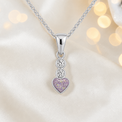 Pleione dainty heart ashes pendant in unicorn purple, handcrafted in Lancashire UK - by Keepsake Memorial Jewellery