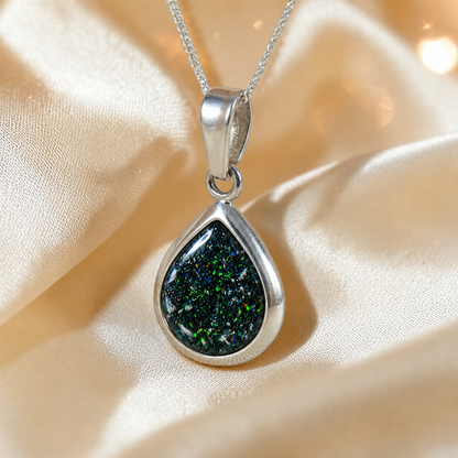 Procyon pear shaped ashes pendant in black flame, handcrafted in Lancashire UK 