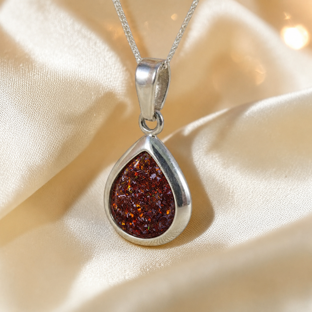 Procyon pear shaped ashes pendant in copper mocha, handcrafted in Lancashire UK