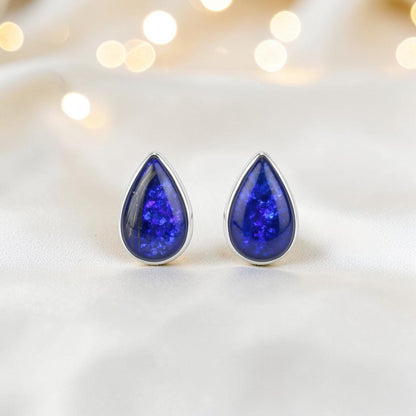 Pure Radiance memorial earrings — sterling silver pear-shaped ashes earrings, handcrafted in Lancashire, UK