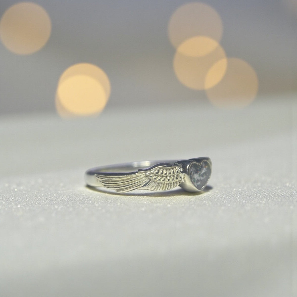 Raphaela Ring — silver angel wing heart memorial ring, handcrafted in Lancashire, UK