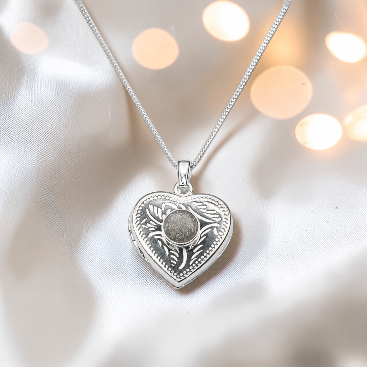 Rasal heart locket with round memorial stone in natural ash, handcrafted in Lancashire UK - by Keepsake Memorial Jewellery