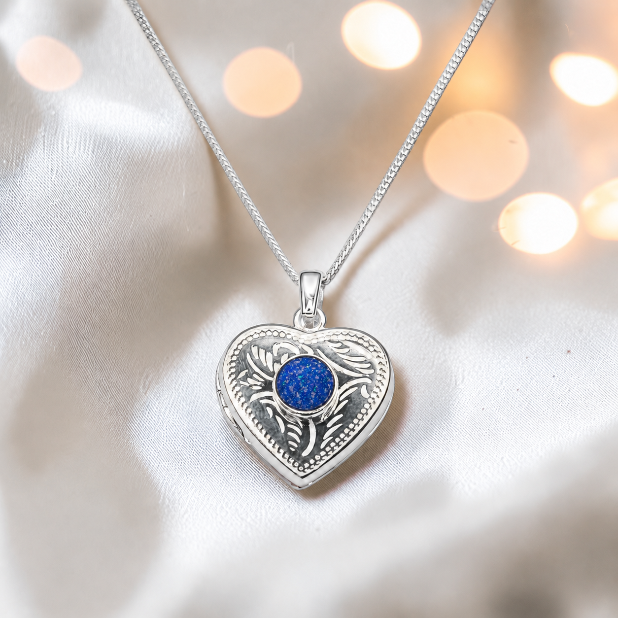 Rasal heart locket with round memorial stone in royal blue, handcrafted in Lancashire UK - by Keepsake Memorial Jewellery