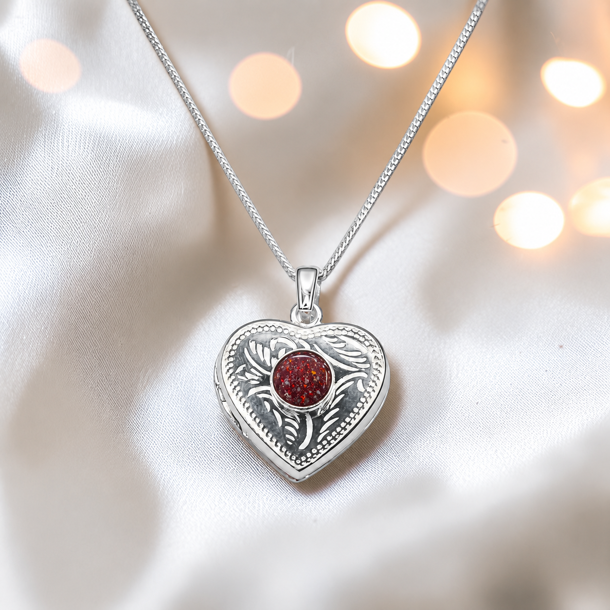 Rasal heart locket with round memorial stone in ruby red, handcrafted in Lancashire UK - by Keepsake Memorial Jewellery