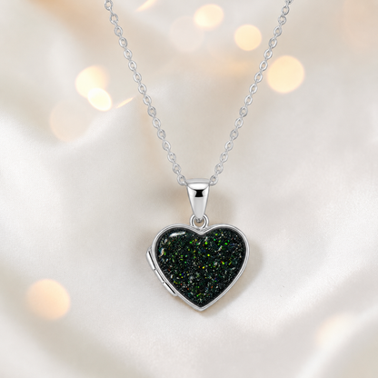 Regulus heart shaped memorial locket in black flame, handcrafted in Lancashire UK - by Keepsake Memorial Jewellery