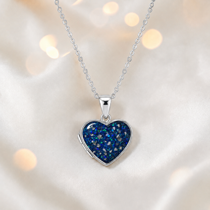 Regulus heart shaped memorial locket in sapphire glow, handcrafted in Lancashire UK - by Keepsake Memorial Jewellery