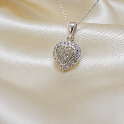 Rigel sterling silver heart ashes pendant with CZ stones, in natural ash, handcrafted in Lancashire UK 