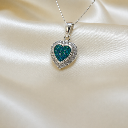 Rigel sterling silver heart ashes pendant with CZ stones, in teal mist, handcrafted in Lancashire UK 