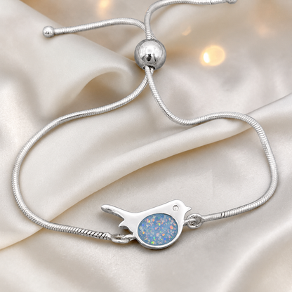 Robin bird memorial ashes bracelet, in baby blue, handcrafted in Lancashire UK - by Keepsake Memorial Jewellery