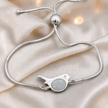 Robin bird memorial ashes bracelet, in white snow, handcrafted in Lancashire UK - by Keepsake Memorial Jewellery