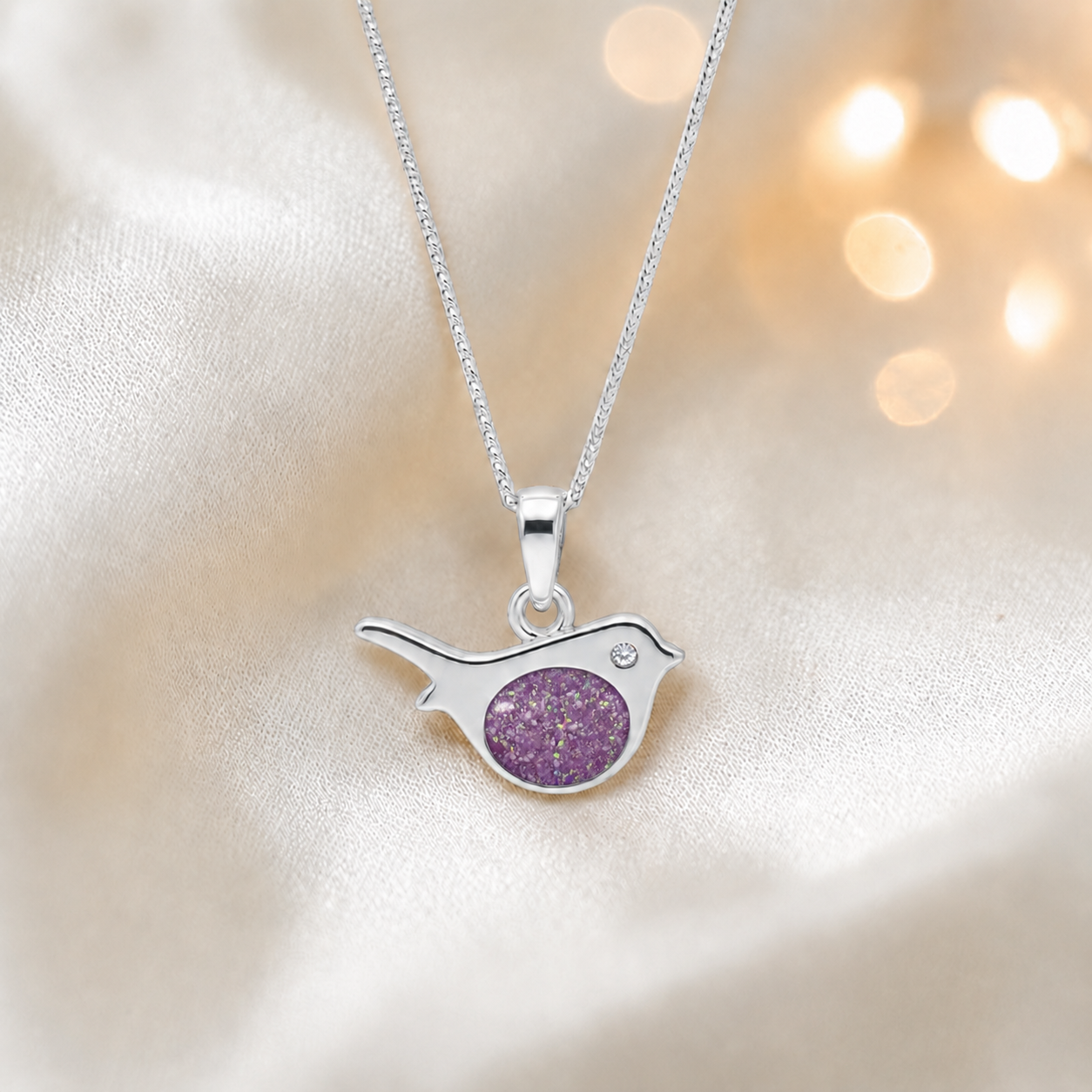 Robin bird shaped white gold memorial pendant in rose pink, handcrafted in Lancashire UK - by Keepsake Memorial Jewellery