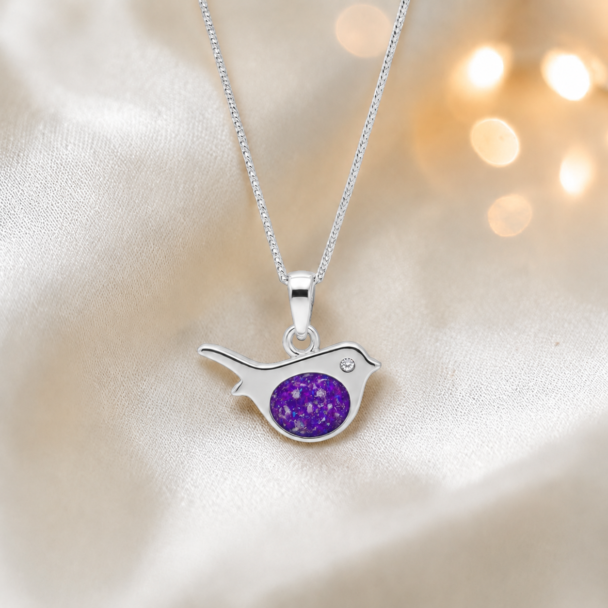 Robin bird shaped white gold memorial pendant in sleepy lavender, handcrafted in Lancashire UK - by Keepsake Memorial Jewellery