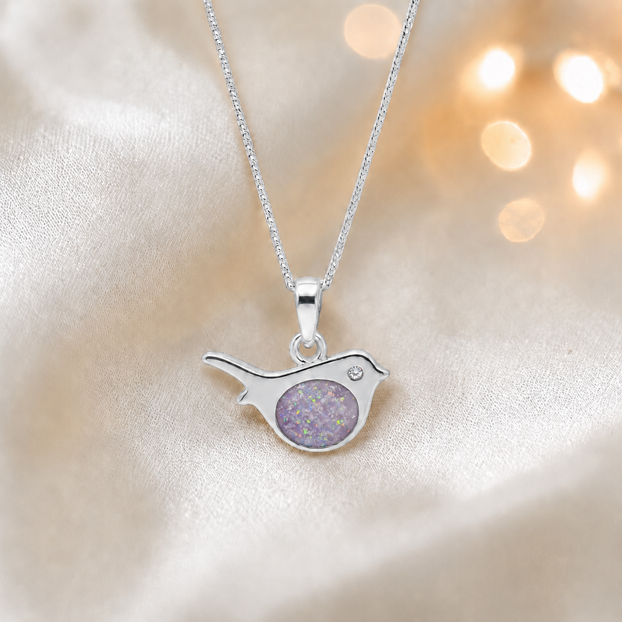 Robin white gold memorial pendant in unicorn purple, handcrafted in Lancashire UK - by Keepsake Memorial Jewellery