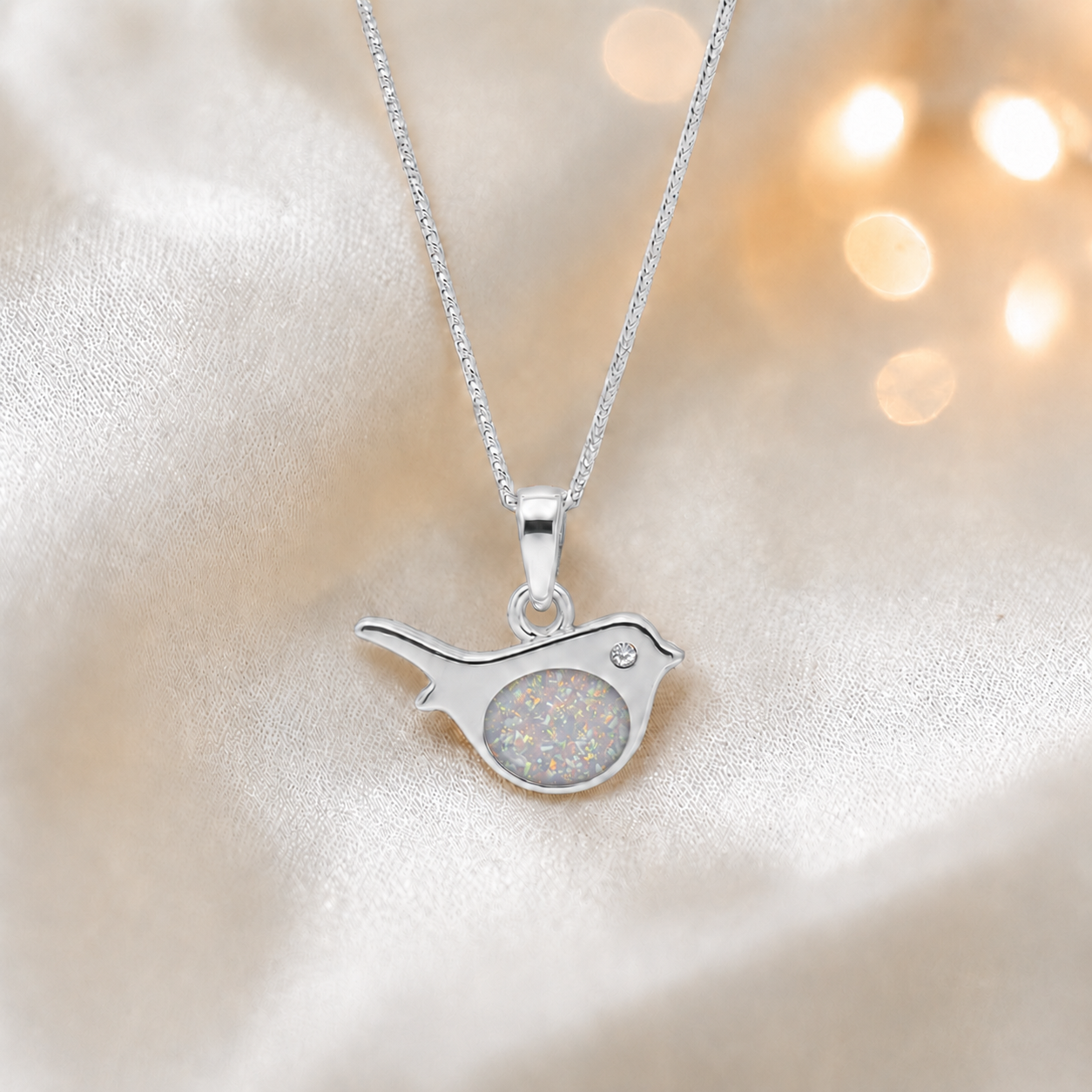 Robin white gold memorial pendant in white snow, handcrafted in Lancashire UK - by Keepsake Memorial Jewellery