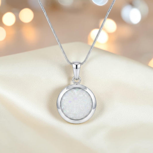 Altair round ashes pendant, handcrafted in Lancashire UK