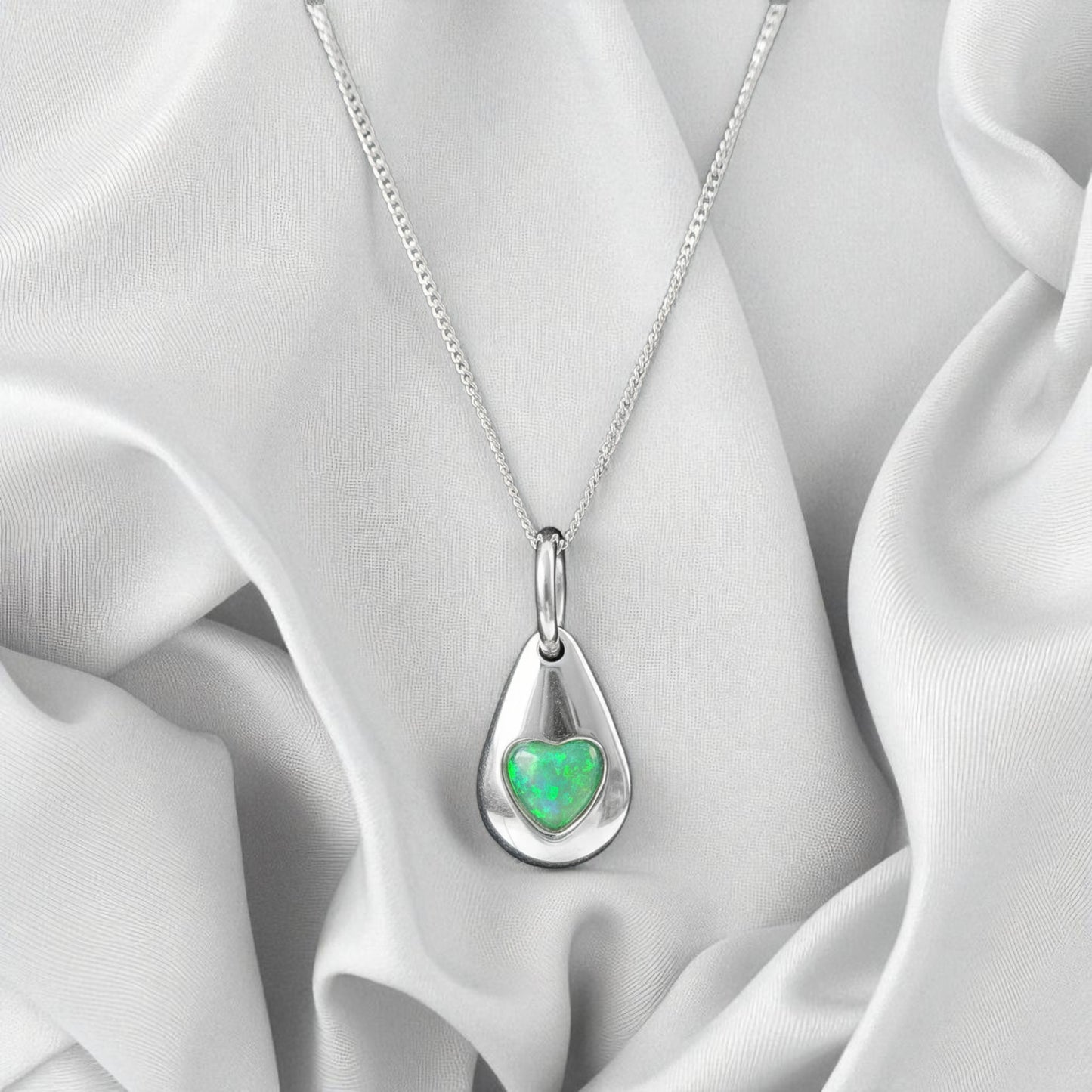 Silver pebble memorial pendant, handcrafted in Lancashire, UK